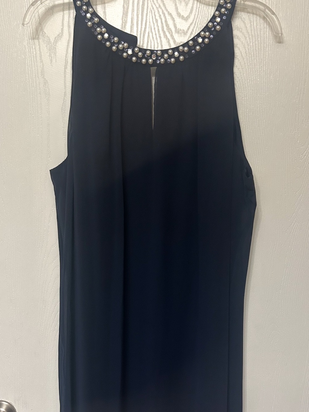Elegant Navy Sleeveless Dress with Beaded Neckline